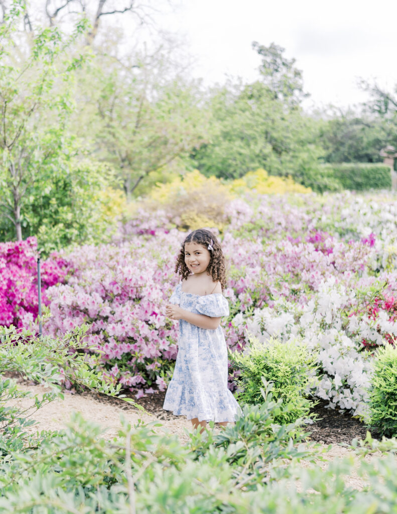 toddler exploring children’s garden Dallas Arboretum